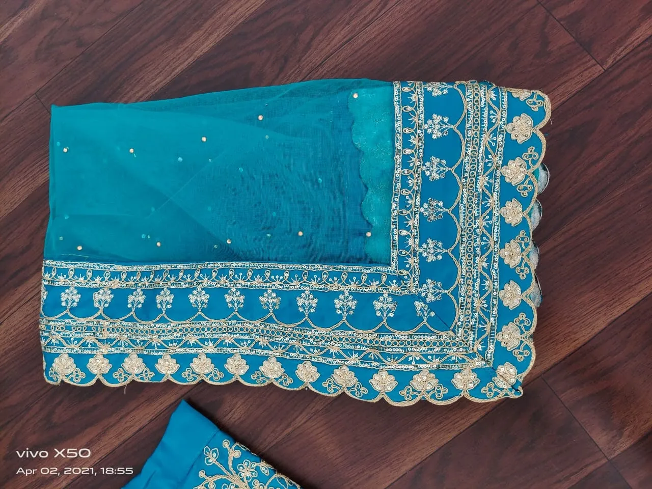 MALAI-SATIN-EMBROIDERY-LEHENGA-IN-BLUE-COLOUR